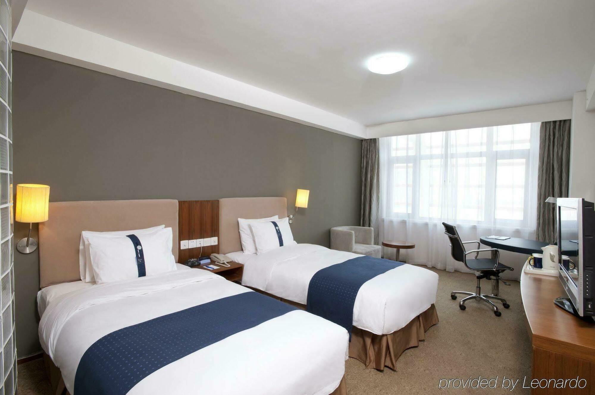 Holiday Inn Express Tianjin Binhai Стая снимка