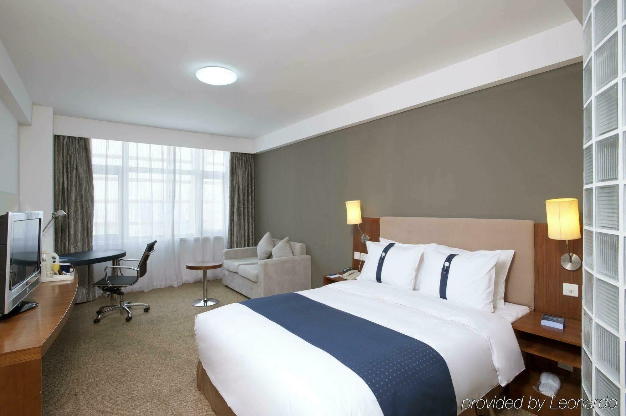 Holiday Inn Express Tianjin Binhai Стая снимка